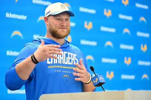 Chargers center Tyler Biadasz speaks to the media at a training camp practice on Saturday, Aug. 1, 2026, in El Segundo. (AP Photo/William Liang)