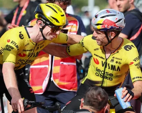 Stage winner Matthew Brennan (left) is congratulated by his Visma-Lease a Bike teammate Wout van Aert.