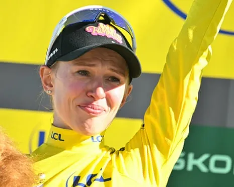 Kasia Niewiadoma celebrates on the podium