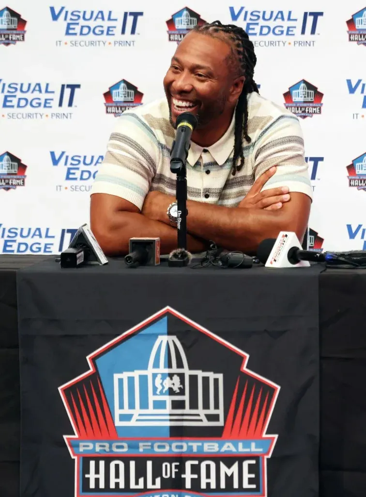 Former Arizona Cardinals receiver Larry Fitzgerald speaks at a press conference before the Carolina Panthers and Arizona Cardinals play at Tom Benson Hall of Fame Stadium in Canton, Ohio, on August 6, 2026. IMAGN IMAGES via Reuters Connect