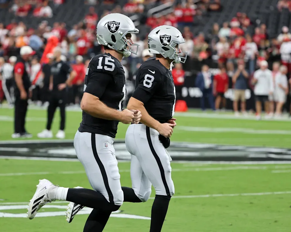 LAS VEGAS, NEVADA - AUGUST 27: Fernando Mendoza #15 and Kirk Cousins #8 of the Las Vegas Raiders take the field for warmups before a preseason game against the San Francisco 49ers at Allegiant Stadium on August 27, 2026 in Las Vegas, Nevada. (Photo by Ethan Miller/Getty Images)