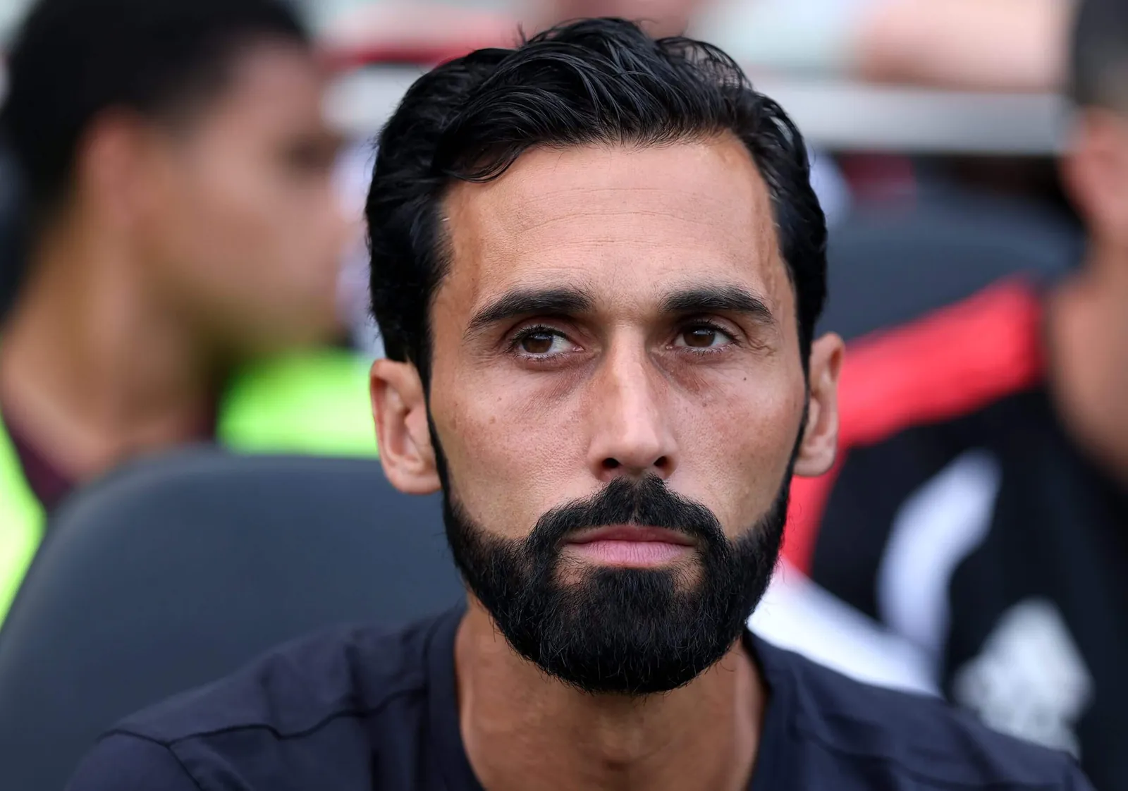 Arbeloa pictured on the Fulham bench in pre-season