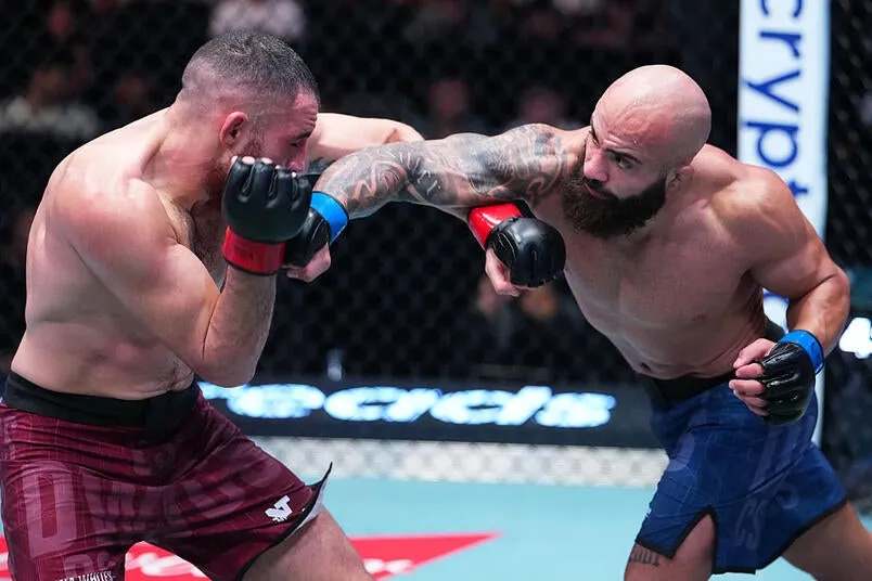 Abe Alsaghir punches Fabrizio Escarrega in a lightweight fight during Dana White's Contender Series Season 10, Week 1 at Meta APEX on August 11, 2026 in Las Vegas, Nevada. (Photo by Jeff Bottari/Zuffa LLC)