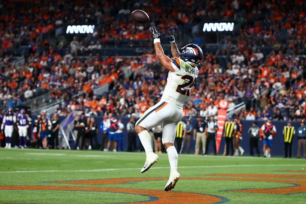 DENVER, CO - AUGUST 28: Cody Schrader #25 of the Denver Broncos catches a pass for a touchdown during the fourth quarter against the Minnesota Vikings in a preseason game at Empower Field at Mile High on August 28, 2026 in Denver, Colorado. The Broncos won the game 34-6. (Photo by Justin Edmonds/Getty Images) | Getty Images
