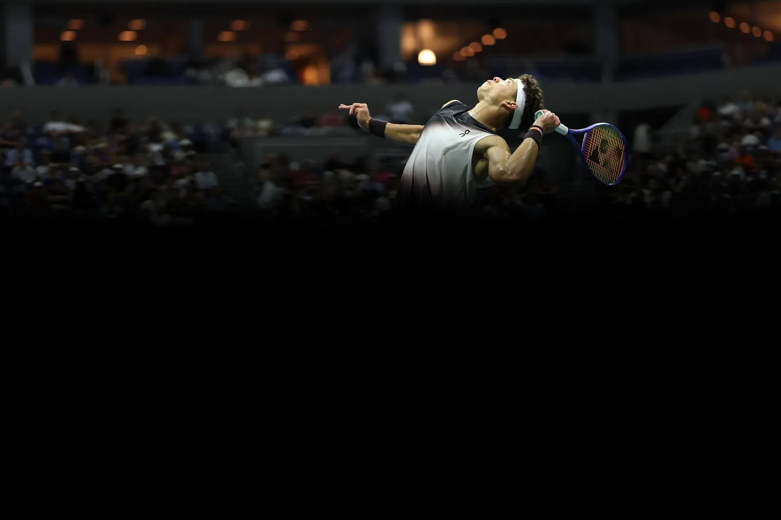 Ben Shelton hits a serve